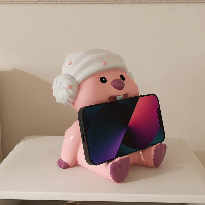 Adorable Pink Cartoon Phone Stand: Fun Desk Decor