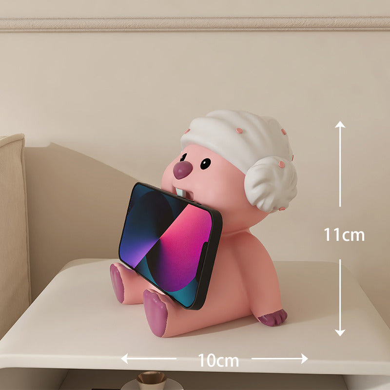 Adorable Pink Cartoon Phone Stand: Fun Desk Decor