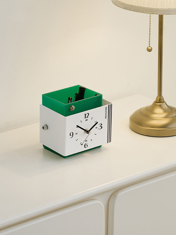 Creative art style clock with pen holder function