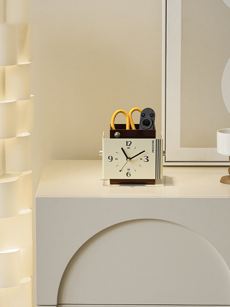 Creative art style clock with pen holder function